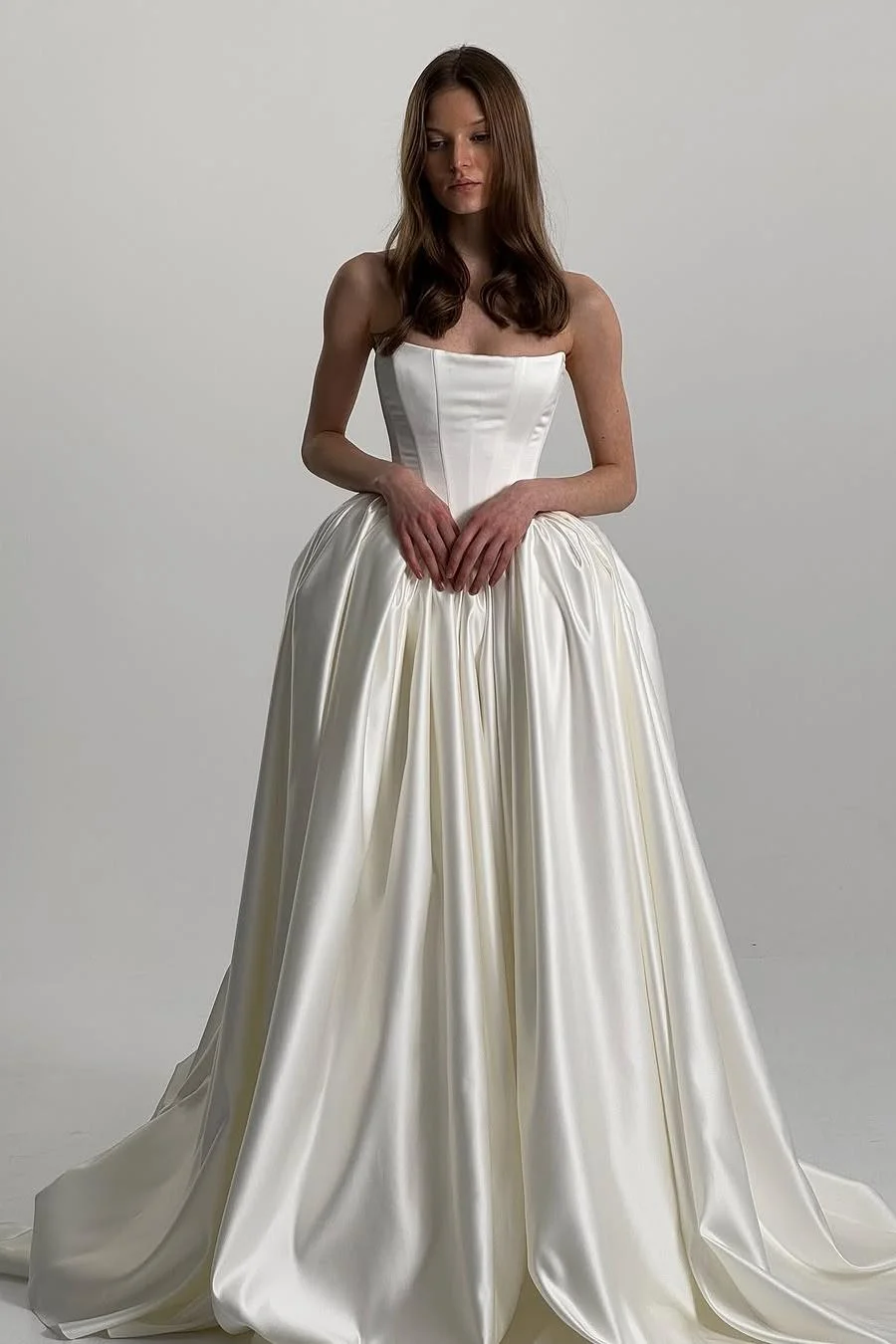 Exquisite Ivory Satin Sleeveless Strapless Long Wedding Dress with Ruffles Exquisite Ivory Satin Sleeveless Strapless Long Wedding Dress with Ruffles