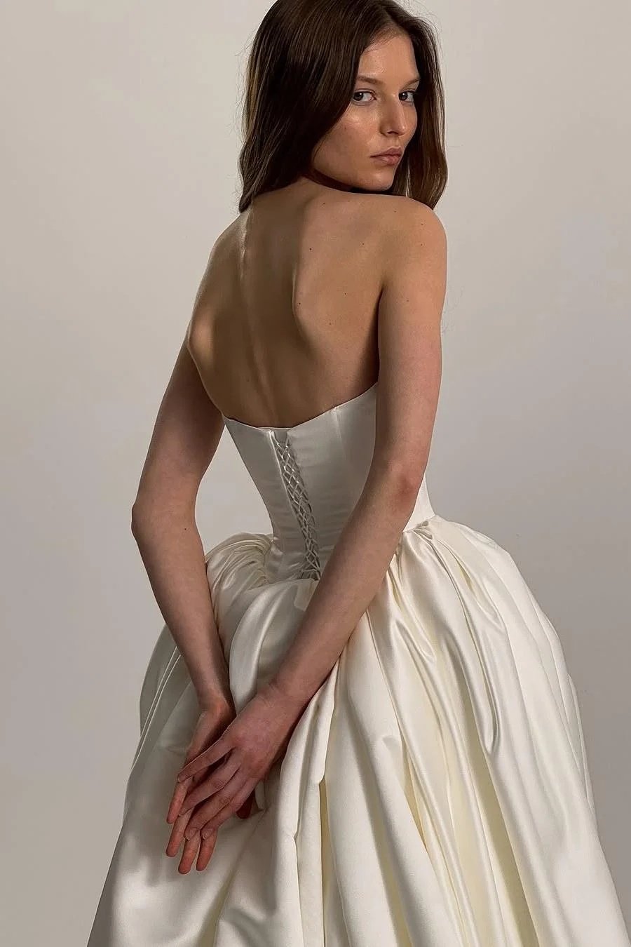 Exquisite Ivory Satin Sleeveless Strapless Long Wedding Dress with Ruffles Exquisite Ivory Satin Sleeveless Strapless Long Wedding Dress with Ruffles