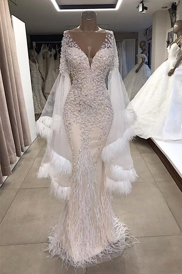 white mermaid prom dress with feathers Jovani 04625 Form fitting floor length dress with mermaid feather bottom
