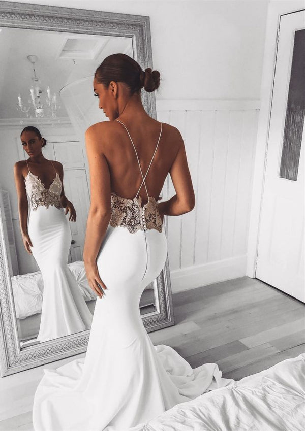Inspired by this wedding dress at ballbella.com,Mermaid style, and Amazing Lace work? We meet all your need with this Classic Modern V-Neck Lace Spaghetti Strap Mermaid Wedding Dress Open Back Bridal Gown.
