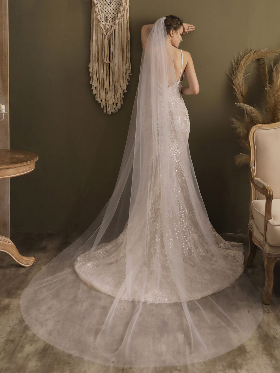 http://www.ballbella.com/cdn/shop/files/white-waterfall-wedding-veils-one-tier-tulle-bridal-veil-wedding-veils_1024x.jpg?v=1701982948