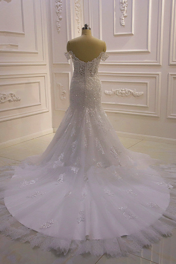 Finding a dress in Tulle, Mermaid style, and delicate Lace,Beading,Appliques work? Ballbella custom made you this AmazingWhite 3D Lace applique Off-the-Shoulder Mermaid Bridal Gowns at factory price.