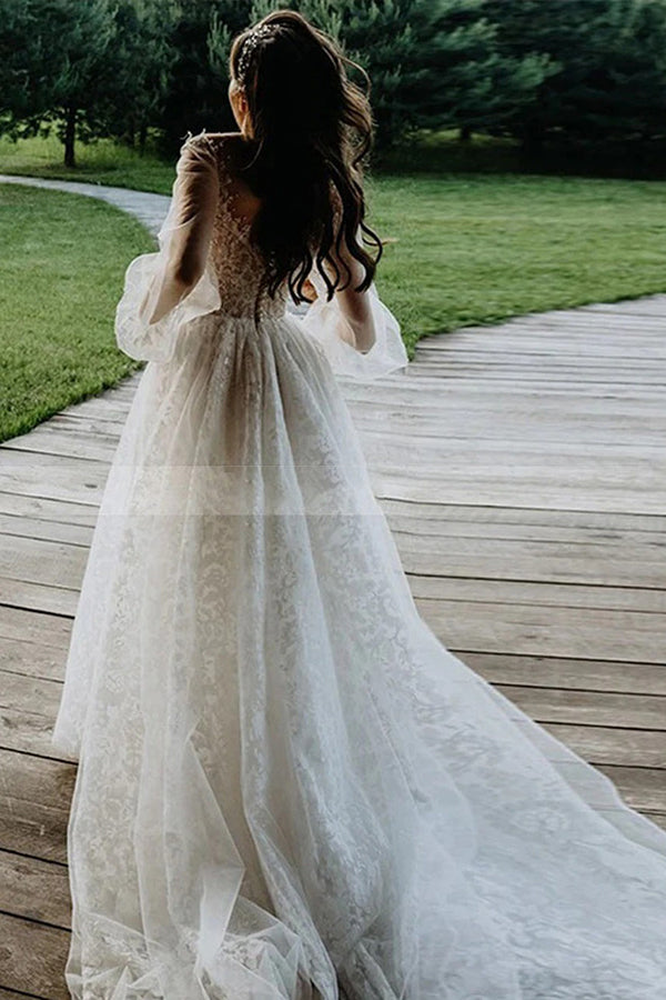 Looking for a dress in Lace, A-line style, and Amazing Lace work? We meet all your need with this Classic Bateau Tulle A-Line Lace Long Sleevess Chapel Train White Wedding Dresses.