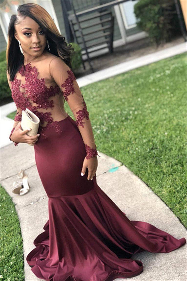 Rock a stunning,  youthful look with our Burgundy Long Sleevess Open Back Mermaid Prom Dress. Shop Ballbella with free shipping on See-Through Appliques Evening Gowns available in all sizes and colors.