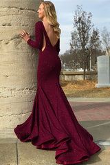 This awesome Round Neck Long Sleevess Backless Prom Party Gowns will make you become the party queen. The Jewel bodice is fully lined,  and the Floor-length skirt with Sequined to provide the flatter look.
