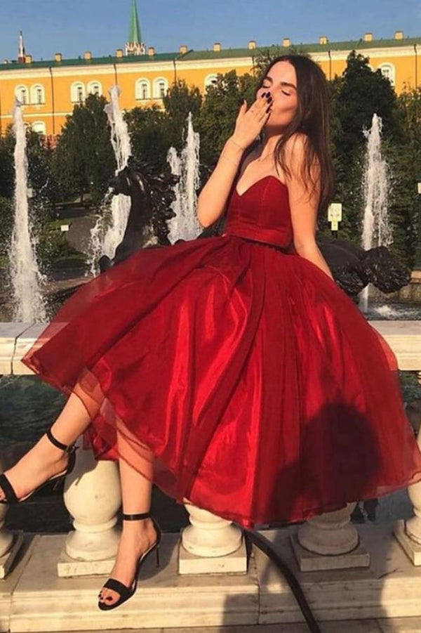 Ballbella offers all kinds of Chic tea length prom dresses,  sort by color,  neckline or fabric,  discover more prom dresses you love today. Try Chic Strapless Red Tea Length Prom Party Gowns| Chic Sweetheart Sleeveless Prom Gown.