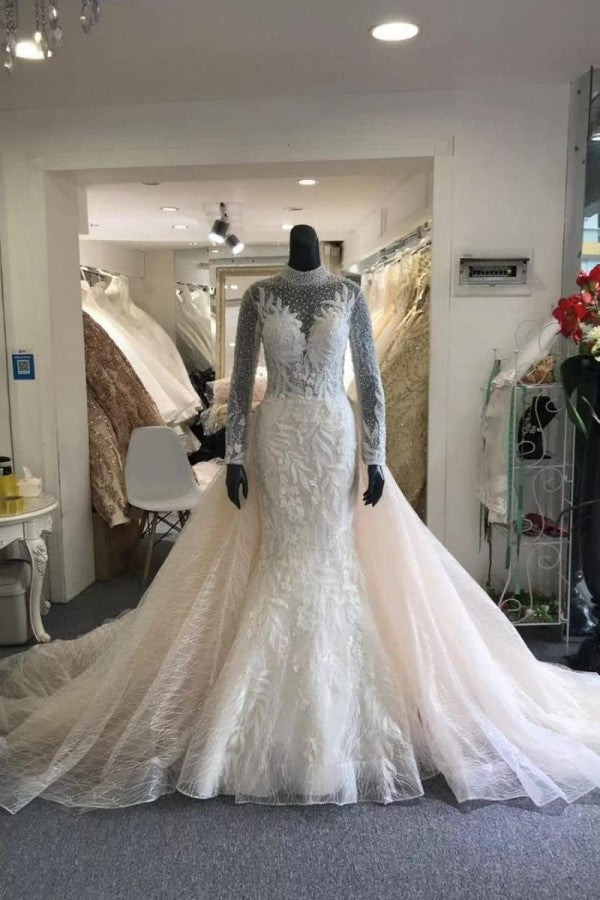 Looking for a dress in Tulle,Lace, Mermaid style, and Amazing Lace work? We meet all your need with this Classic Classic Collar Long Sleeves Floral Pattern Mermaid Wedding Dress Detachable Sweep Train.