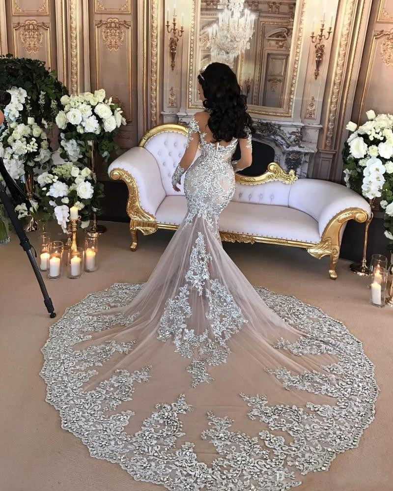 Wanna get a dress in Mermaid style, and delicate Lace,Crystal work? Ballbella custom made you this Classic High neck Long Sleevess Mermaid Wedding Dress Silver Tulle Bridal Gowns with Lace Appliques at factory price.