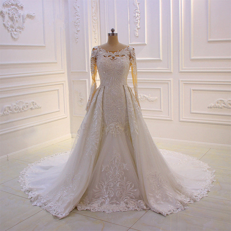 Wanna get a dress in Tulle, Mermaid style, and delicate Lace,Beading,Appliques work? We meet all your need with this Classic Classic Jewel Long Sleevess Tulle Lace Sparkle Ivory Wedding Dress at factory price.