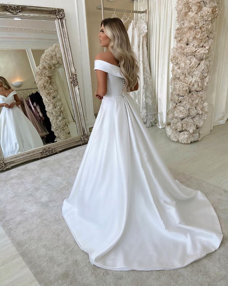 This Classic Off The Shoulder V-neck Wedding Dresses A-line Pleated Bridal Gowns at Ballbella comes in all sizes and colors. Shop a selection of formal dresses for special occasion and weddings at reasonable price.