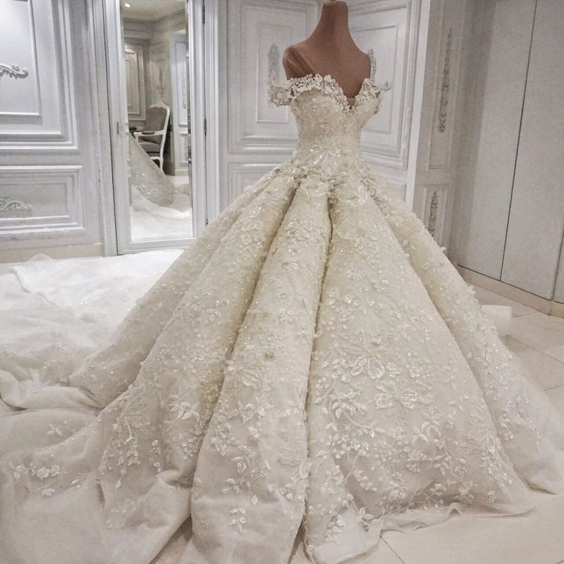 Ballbella offers Classic Off-theshoulder Luxurious Appliques Ball Gown Wedding Dress online at an affordable price from to Ball Gown skirts. Shop for Amazing wedding collections for your big day.