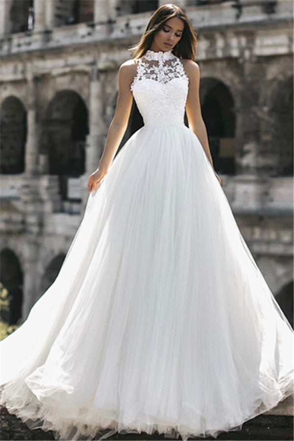 This beautiful Elegant High Neck Sleeveless Appliques A-Line Floor-Length Wedding Dresses will make your guests say wow. The High Neck bodice is thoughtfully lined,  and the Floor-length skirt with Appliques to provide the airy,  flatter look of Lace.