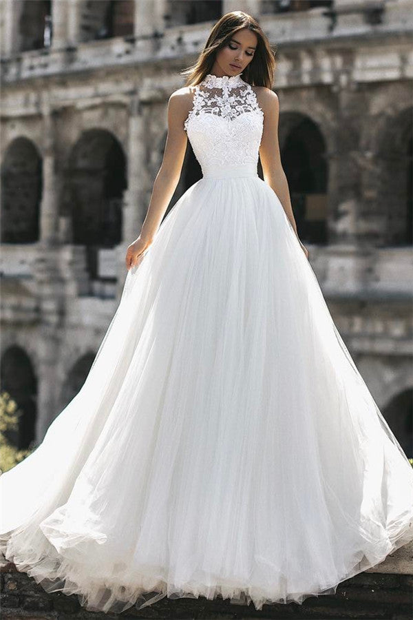 This beautiful Elegant High Neck Sleeveless Appliques A-Line Floor-Length Wedding Dresses will make your guests say wow. The High Neck bodice is thoughtfully lined,  and the Floor-length skirt with Appliques to provide the airy,  flatter look of Lace.