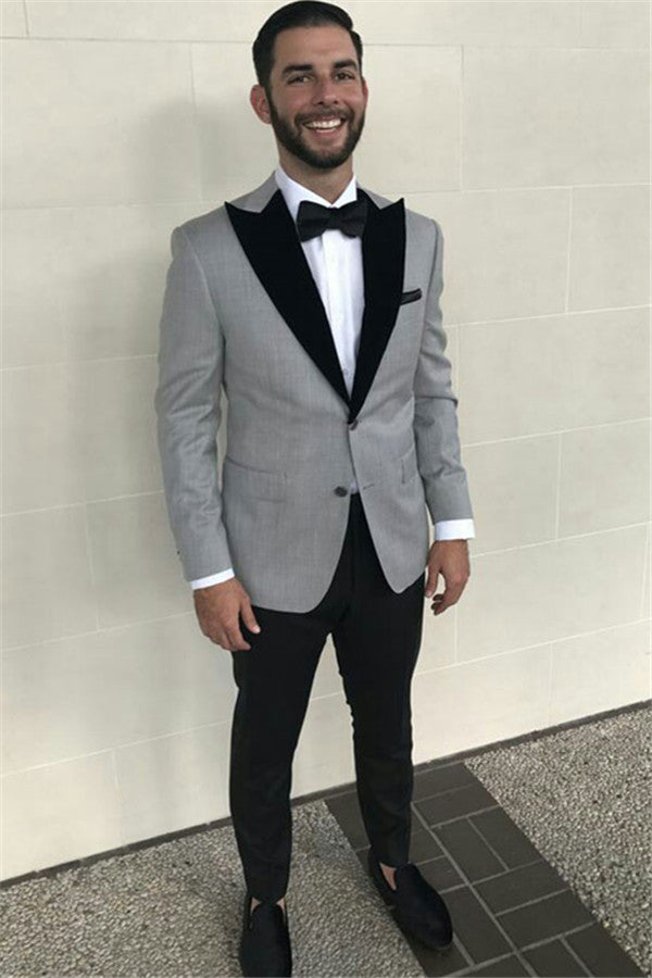 The Bespoke Peaked Lapel Single Breasted Men Suit is an essential part of any wardrobe. Whether you need a sharp business suit, a Custom design black tie evening look or a wedding or prom suit, you will find the perfect fit in Ballbella collection.made this Formal Grey Slim Fit Business Mens Suits with Black Peaked Lapel with rush order service.