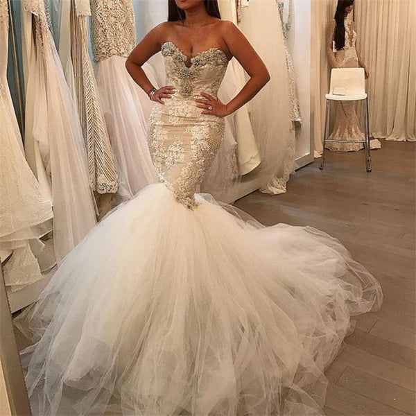 No idea what to wear for your big day? Ballbella custom made you this Tulle Lace Sweetheart Crystal Bridal Gowns at factory price.
