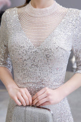 Looking for Prom Dresses, Evening Dresses, Homecoming Dresses, Quinceanera dresses in Tulle, Sequined,  Mermaid style,  and Gorgeous Beading, Buttons, Sequined work? Ballbella has all covered on this elegant Gorgeous Silver Long Sleevess Long Prom Dress.