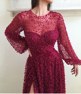 Wanna Prom Dresses, Evening Dresses in A-line style,  and delicate Beading work? Ballbella has all covered on this elegant Illusion neck Scarlet Long Sleevess Side Slit Evening Dresses Flare sleeves Princess Beaded Prom Dresses with Bow yet cheap price.
