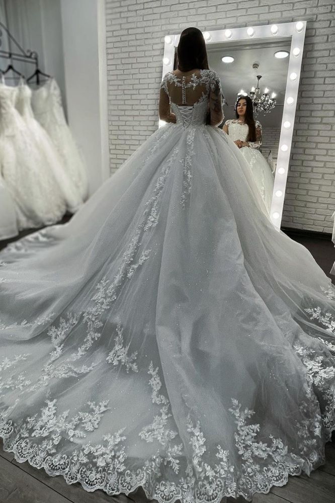 Looking for a dress in Tulle, Ball Gown style, and Amazing Lace,Beading work? We meet all your need with this Classic Long Sleevess Lace Appliques Tulle Wedding Gown White Garden Aline Spring Bridal Gown.