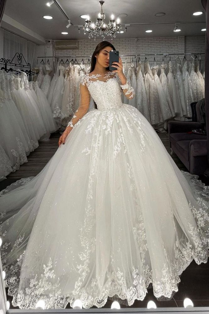 Looking for a dress in Tulle, Ball Gown style, and Amazing Lace,Beading work? We meet all your need with this Classic Long Sleevess Lace Appliques Tulle Wedding Gown White Garden Aline Spring Bridal Gown.