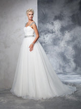 This Long Tulle Ball Gown Straps Ruched Sleeveless Wedding Dresses at ballbella at ballbella.com, this dress will make your guests say wow. The bodice is thoughtfully lined, and the Floor-length skirt with to provide the airy.