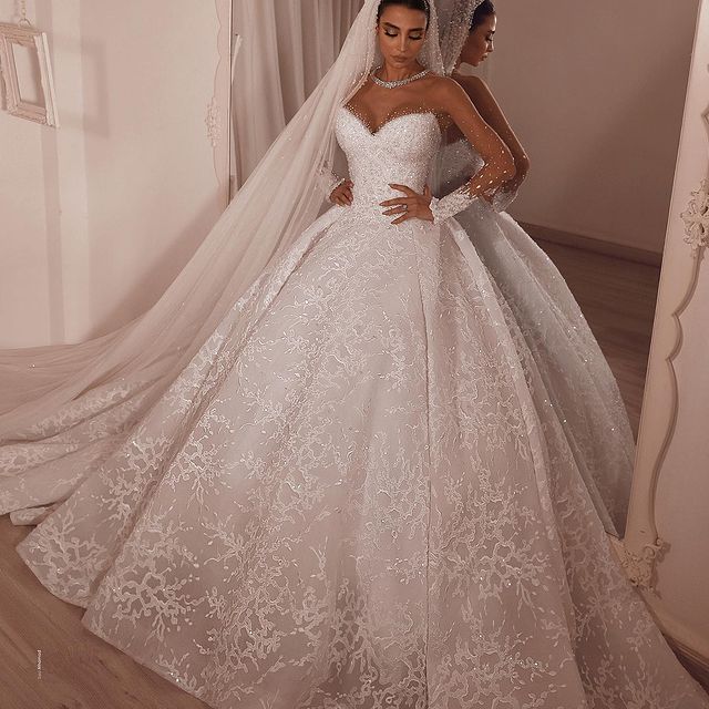 Ballbella.com supplies you Luxurious Sparkle Beaded Ball Gown Tulle Lace Illusion neck Wedding Dress online at an affordable price, 1000+ options to choose from.