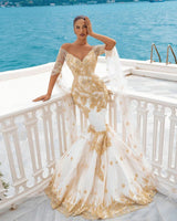Ballbella offers Mermaid Bridal Gowns Gold Appliques Half Sleeve Cape at a good price, 1000+ options, fast delivery worldwide.