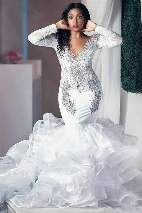 Inspired by this wedding dress at ballbella.com,Mermaid style, and Amazing Beading work? We meet all your need with this Classic Modern Beading Appliques Wedding Dresses Long Sleeves Mermaid Tulle Bridal Gowns.