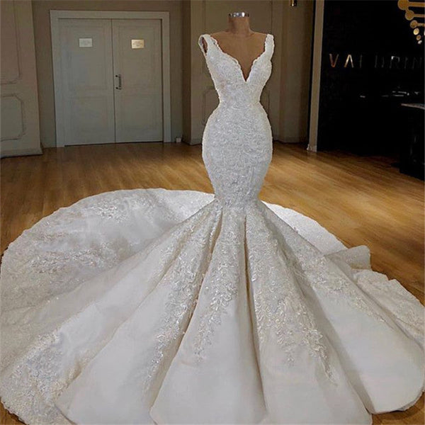 Custom made this mermaid lace appliques wedding dress on Ballbella.com. We offer extra coupons, make dresses in and affordable price. We provide worldwide shipping and will make the dress perfect for everyoneone.
