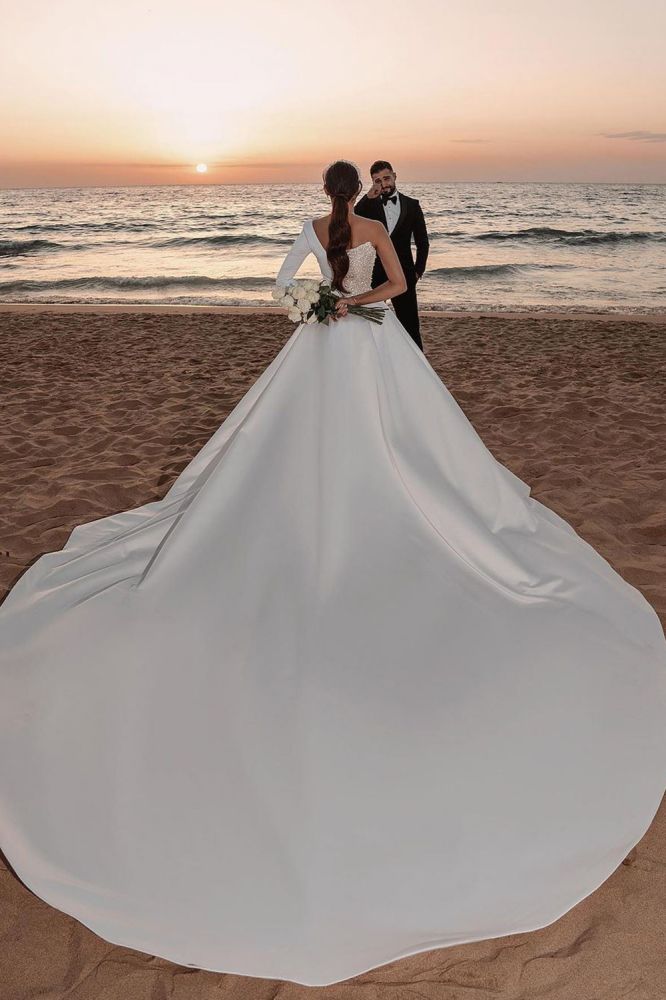 Ballbella offers Modern One Shoulder Ruffles Satin Sparkly Seqiuns Mermaid Bridal Dress with Sweep Court Train at a good price, 1000+ options, fast delivery worldwide.