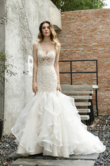 Modern See through Lace Mermaid Lace Sleeveless Ivory Wedding Dress with Ruffles Train-Ballbella