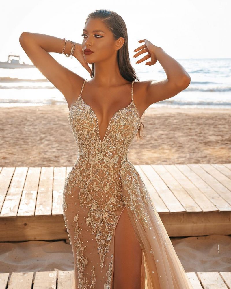 Looking for a dress in Satin, A-line style, and Amazing Appliques,Split Front work? We meet all your need with this Classic Modern Spaghetti Side Split Tulle Beach Wedding Dress.