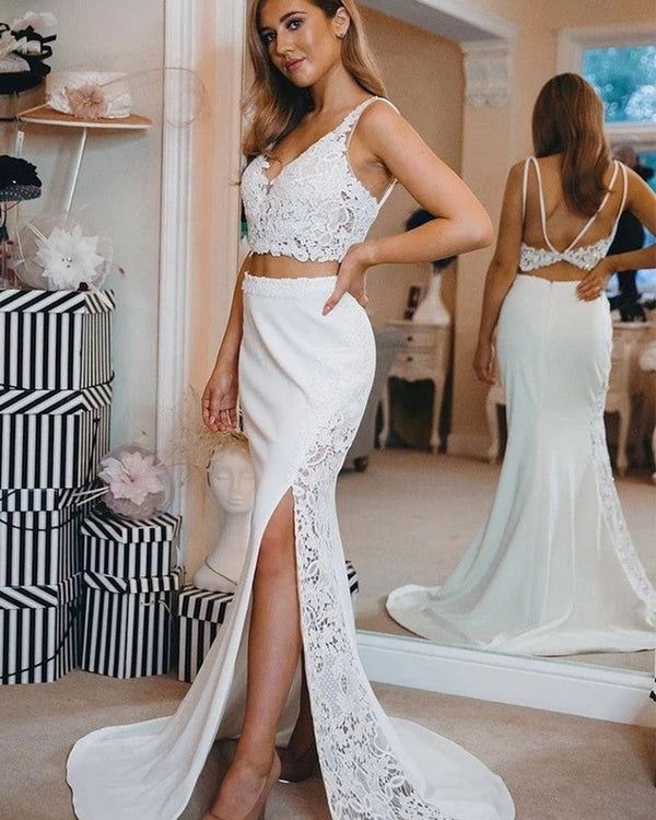 Inspired by this wedding dress at ballbella.com,Mermaid style, and Amazing Lace work? We meet all your need with this Classic Modern two-pieces Spaghetti V-Neck Lace Side Slit Beach Wedding Dress.