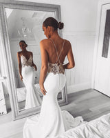 Inspired by this wedding dress at ballbella.com,Mermaid style, and Amazing Lace work? We meet all your need with this Classic Modern V-Neck Lace Spaghetti Strap Mermaid Wedding Dress Open Back Bridal Gown.