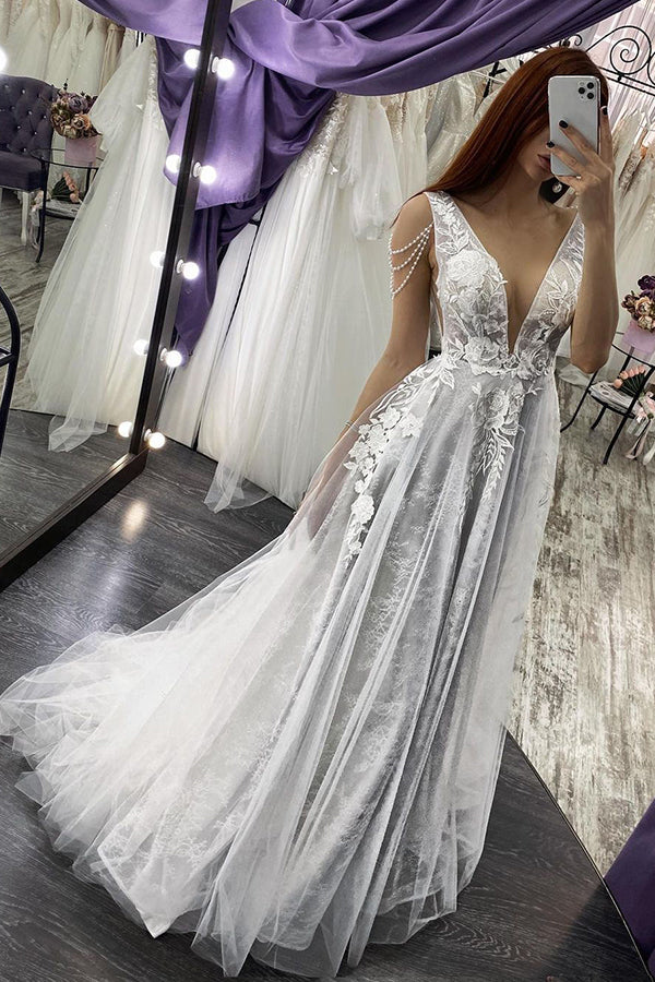 Looking for a dress in Tulle, A-line style, and Amazing Lace,Beading,Appliques work? We meet all your need with this Classic Modern V-Neck Sleeveless Aline Wedding Dress Floral Lace Bridal Dress.