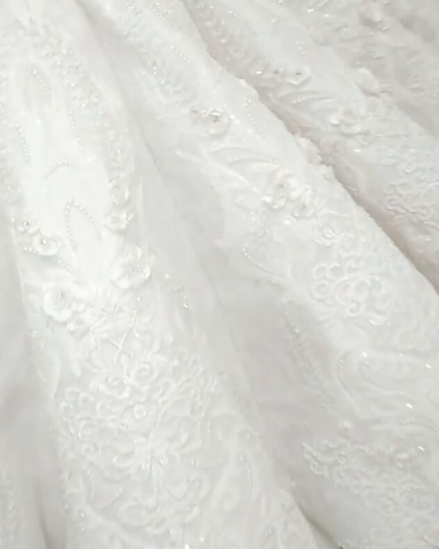 Inspired by this wedding dress at ballbella.com,Mermaid style, and Amazing Crystal work? We meet all your need with this Classic latest V Neck Cap Sleeve Beads Crystals Mermaid Wedding Dress Lace Applique.