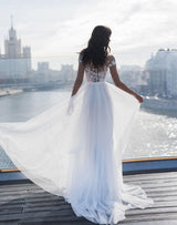 This Off The Shoulder Appliques A-line Wedding Dresses Side Split Tulle Bridal Gowns at Ballbella comes in all sizes and colors. Shop a selection of formal dresses for special occasion and weddings at reasonable price.