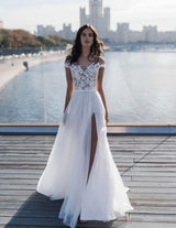 This Off The Shoulder Appliques A-line Wedding Dresses Side Split Tulle Bridal Gowns at Ballbella comes in all sizes and colors. Shop a selection of formal dresses for special occasion and weddings at reasonable price.