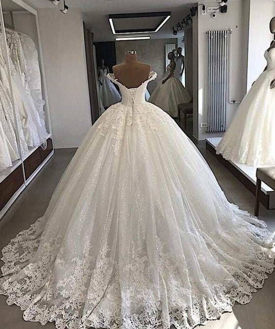 Ballbella offers beautiful Off-the-shoulder Lace Bridal Gowns online. Get this for your big day to shock everyone wedding guests.