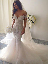 This Sleeveless Mermaid Tulle Chapel Train Wedding Dresses at ballbella.com will make your guests say wow. The Off-the-shoulder bodice is thoughtfully lined, and the skirt with to provide the airy.