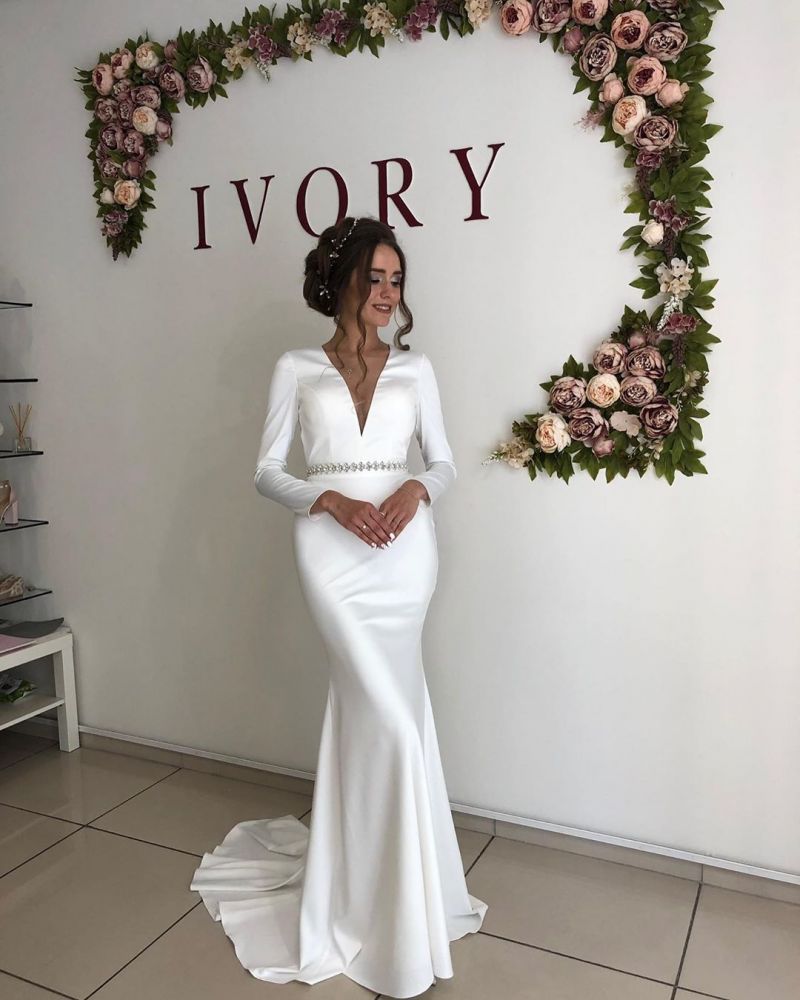 Ballbella offers Simple Shining White V-neck Mermaid Pearl Belt Court Train Open back Bridal Gown online at an affordable price from Satin to Column skirts. Shop for Amazing Long Sleeves collections for your bridal party.