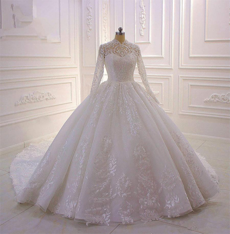 Wanna get a dress in Tulle, Ball Gown style, and delicate Lace,Beading,Appliques,Ruffless work? We meet all your need with this Classic Sparkle Lace Ball Gown High Neck Tull Long Sleevess Wedding Dress at factory price.