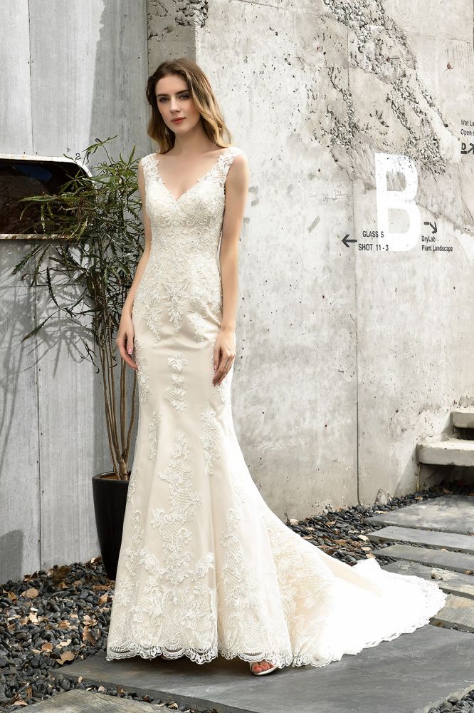 Can't decide what to wear for your big day. Ballbella has Fit-and-flare Lace Open Back Beach Wedding Dress avilable in White, Ivroy and champange. Try this simple bridal gowns for your summer wedding.