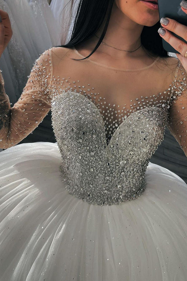 Looking for a dress in Tulle, Ball Gown style, and AmazingBeading work? We meet all your need with this Classic Stylish Glitter Sequins Aline Ball Gown Long Sleevess Bridal Gown.