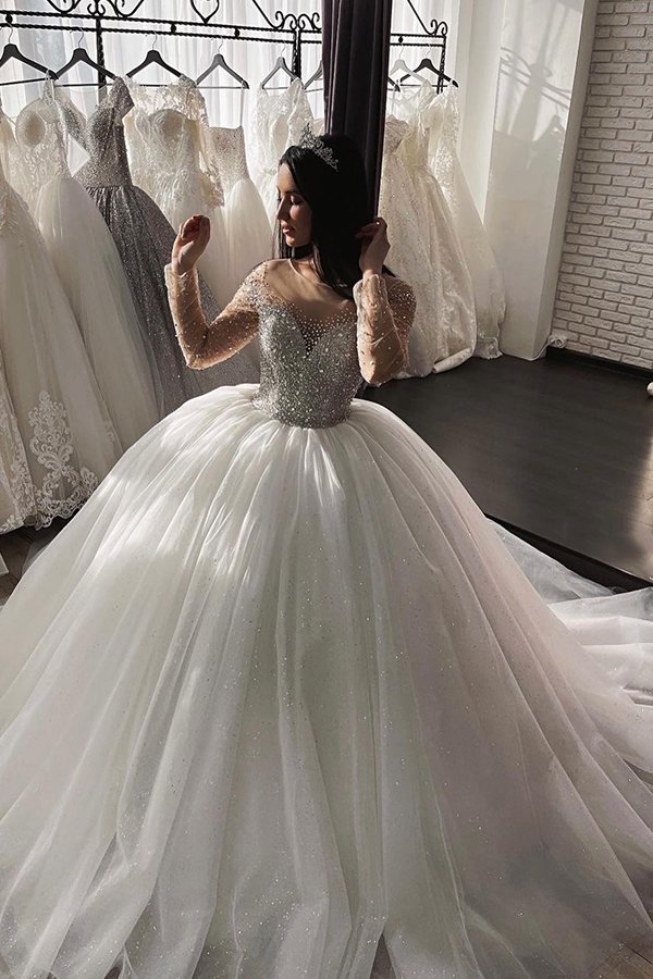 Looking for a dress in Tulle, Ball Gown style, and AmazingBeading work? We meet all your need with this Classic Stylish Glitter Sequins Aline Ball Gown Long Sleevess Bridal Gown.