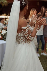 Ballbella offers Stylish Lace Appliques Aline Tulle Casual Wedding Dress Long Sleeves Garden Wedding Gown at a good price, 1000+ options, fast delivery worldwide.