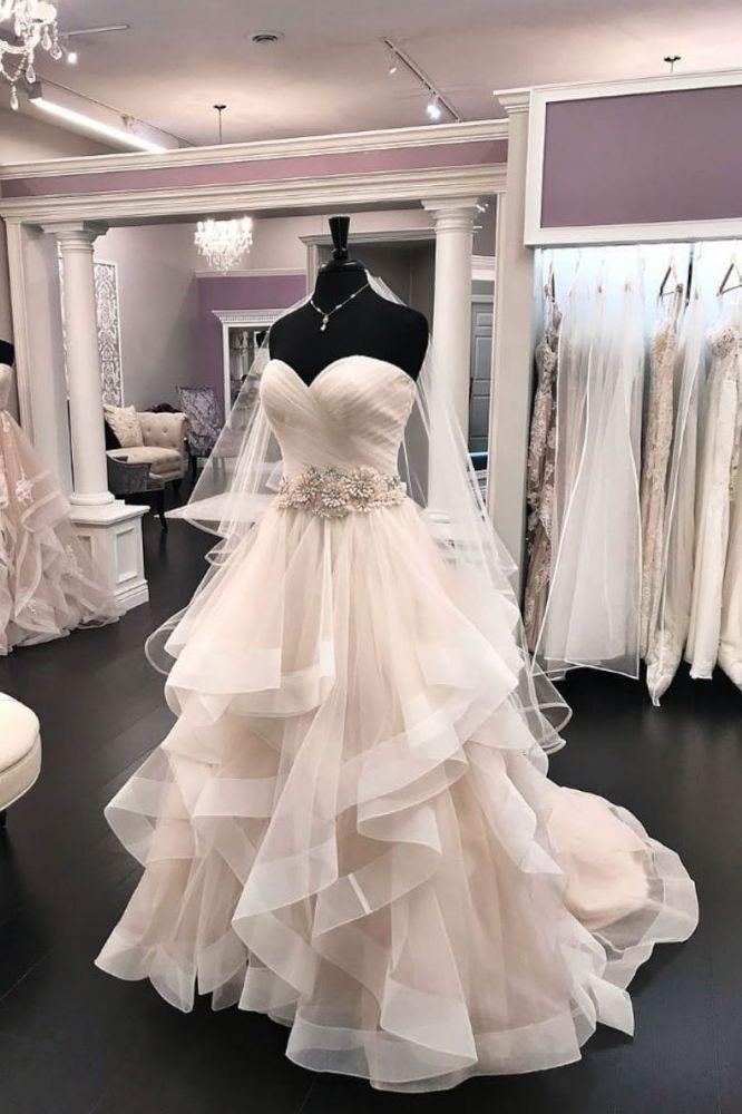 Wanna get a dress in Tulle, A-line style, and delicate work? We meet all your need with this Classic Sweetheart Champange Ruffless Ball Gown Princess Wedding Dress at factory price.