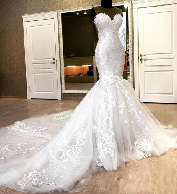 Ballbella offers Sweetheart White Illusion neck Mermaid Beaded Lace Wedding Dress online at an affordable price from Tulle to Mermaid skirts. Shop for Amazing Sleeveless wedding collections for your big day.