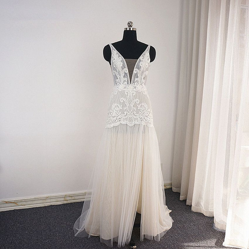 Ballbella offers Trendy Ivory Sleeveless Lace Tulle High split A-line Wedding Dress online at an affordable price from Tulle to A-line Floor-length skirts. Shop for Amazing Sleeveless wedding collections for your big day.