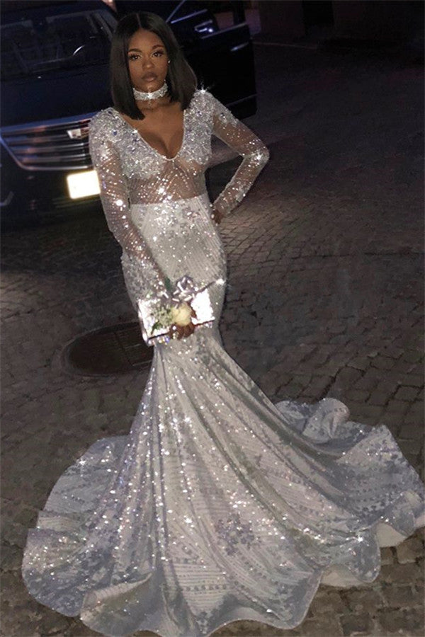 This beautiful Unique V-Neck Long Sleevess Sequins Mermaid Floor-Length Prom Dresses will make your guests say wow. The V-neck bodice is thoughtfully lined,  and the Floor-length skirt with Sequined to provide the airy,  flatter look.