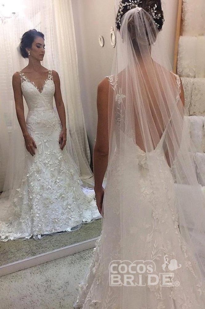 Ballbella offers V-neck sleevless Mermaid White Wedding Dress with Court Train online at an affordable price from Tulle to Column Floor-length skirts. Shop for Amazing Sleeveless wedding collections for your big day.
